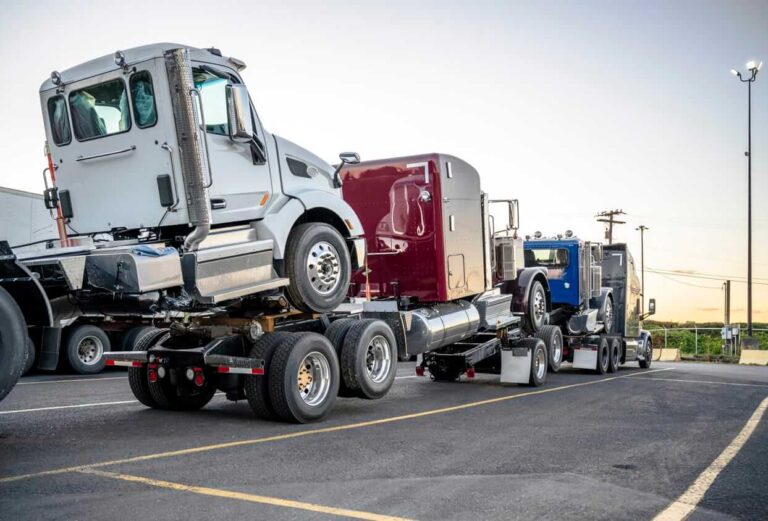 Trucks being towed